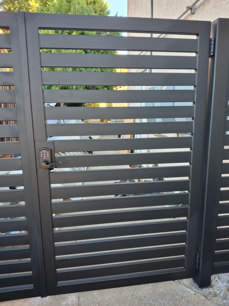 Modern privacy gate with powder coated iron frame in San Jose